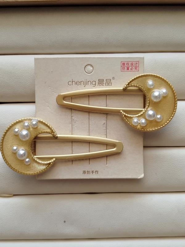 گل سر تق تقی طرح ماه مرواریدی بسته 2 عددی کد 57